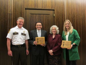 Sustainable Saint Paul award recipients holding awards